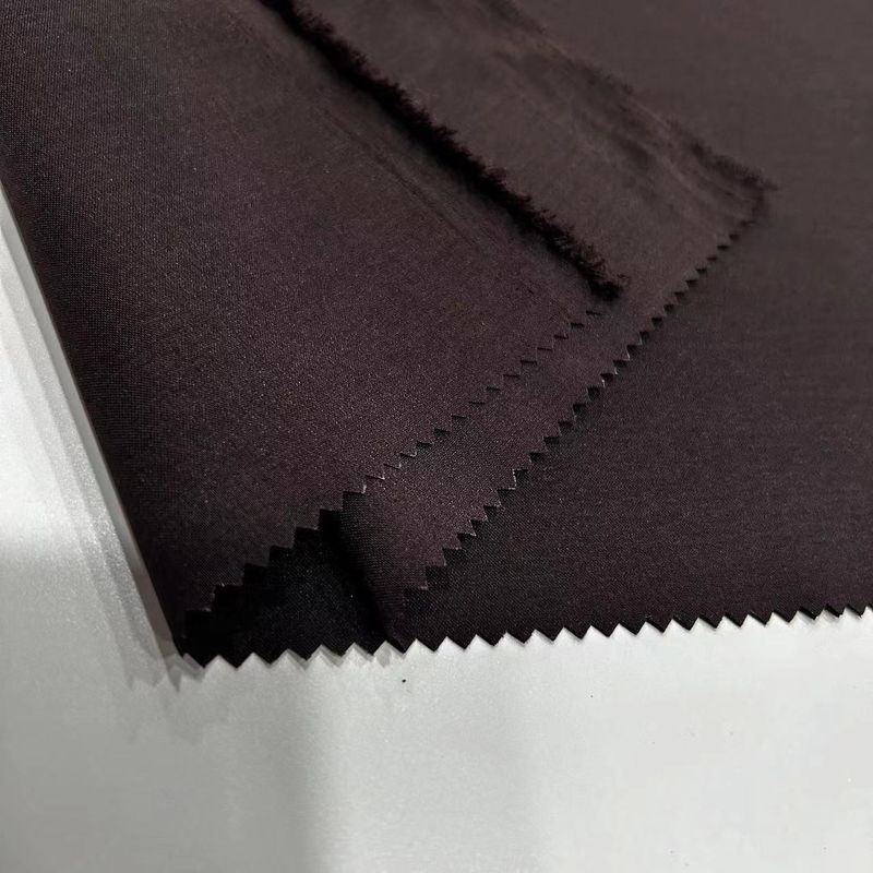 Geri dönüştürülmüş Warp Tricked Polyester Kumaş Elastan Plain Weave 170D*170D+40D Giysi için