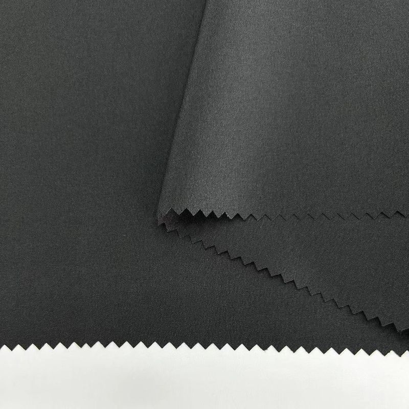 Yaylı poliester 150D örgü örgü kumaşı 150D*150D+40D 98% Poliester 2% Spandex 166GSM